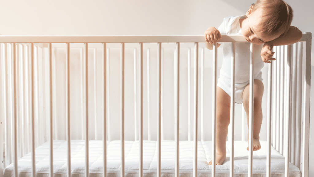 baby standing in crib